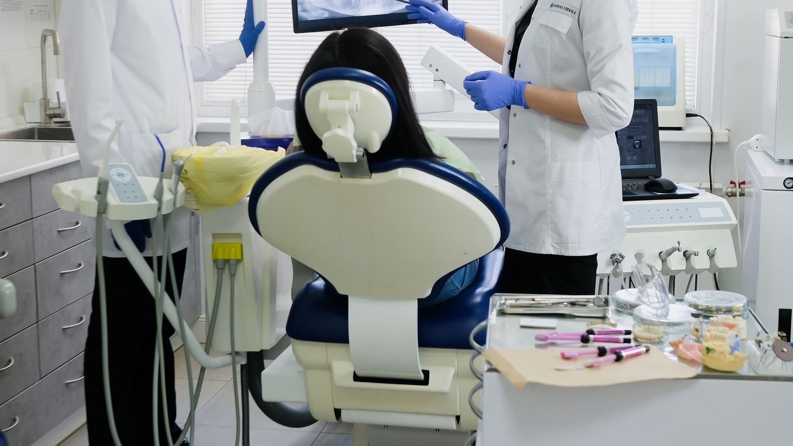 Dentist treating a patient in a modern dental clinic